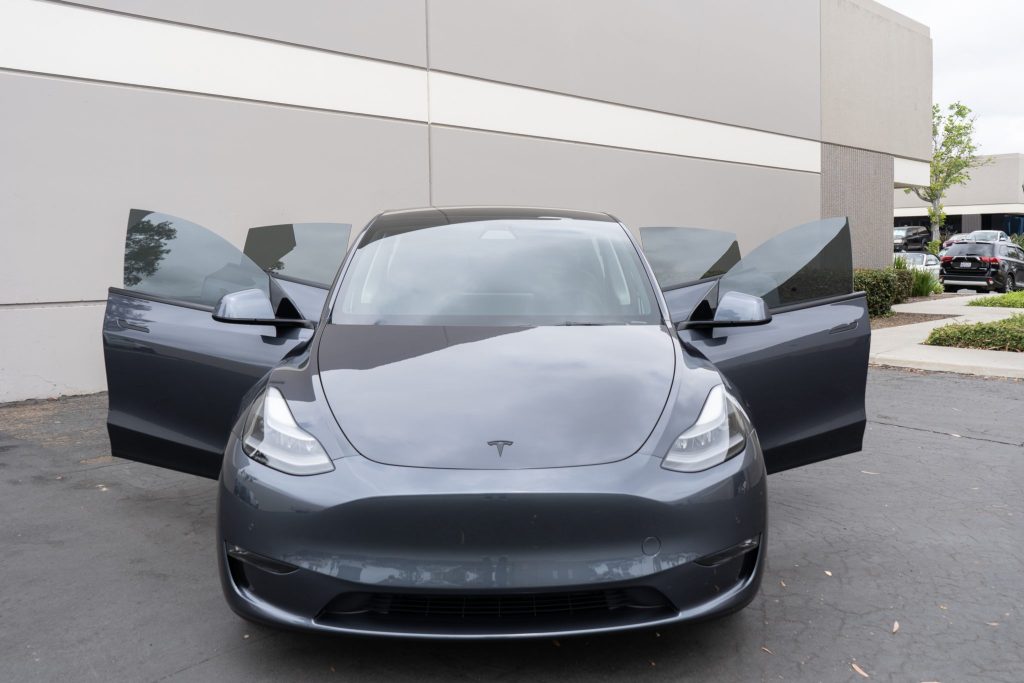 Doors open showing Window Tint on windows of Tesla Model Y