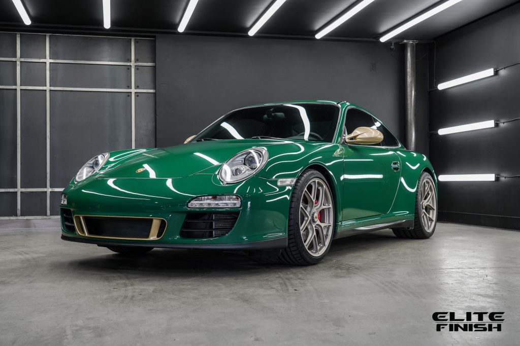 Porsche 911 with Green PPF and HRE Wheels.