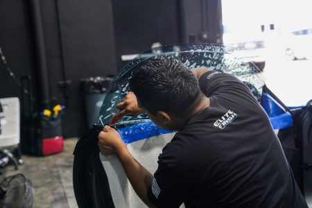 Installing Window Tint on BMW window in San Diego